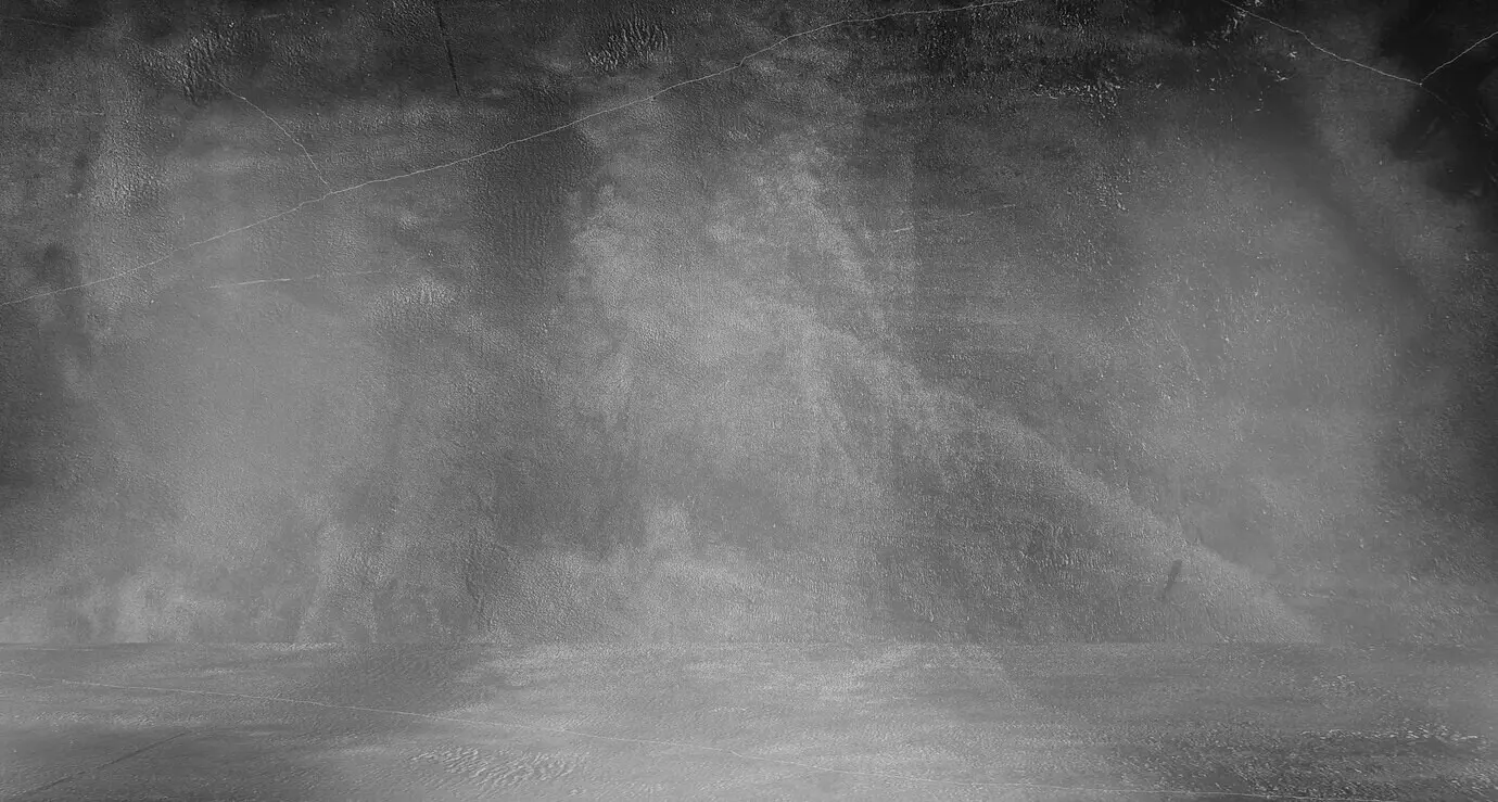 Alter schwarzer Hintergrund. Grunge-Textur. Dunkle Tapete. Tafel (Schultafel). Beton.